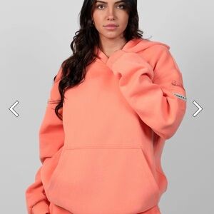 Women's Vibrant Coral “Travel Essentials” Hoodie